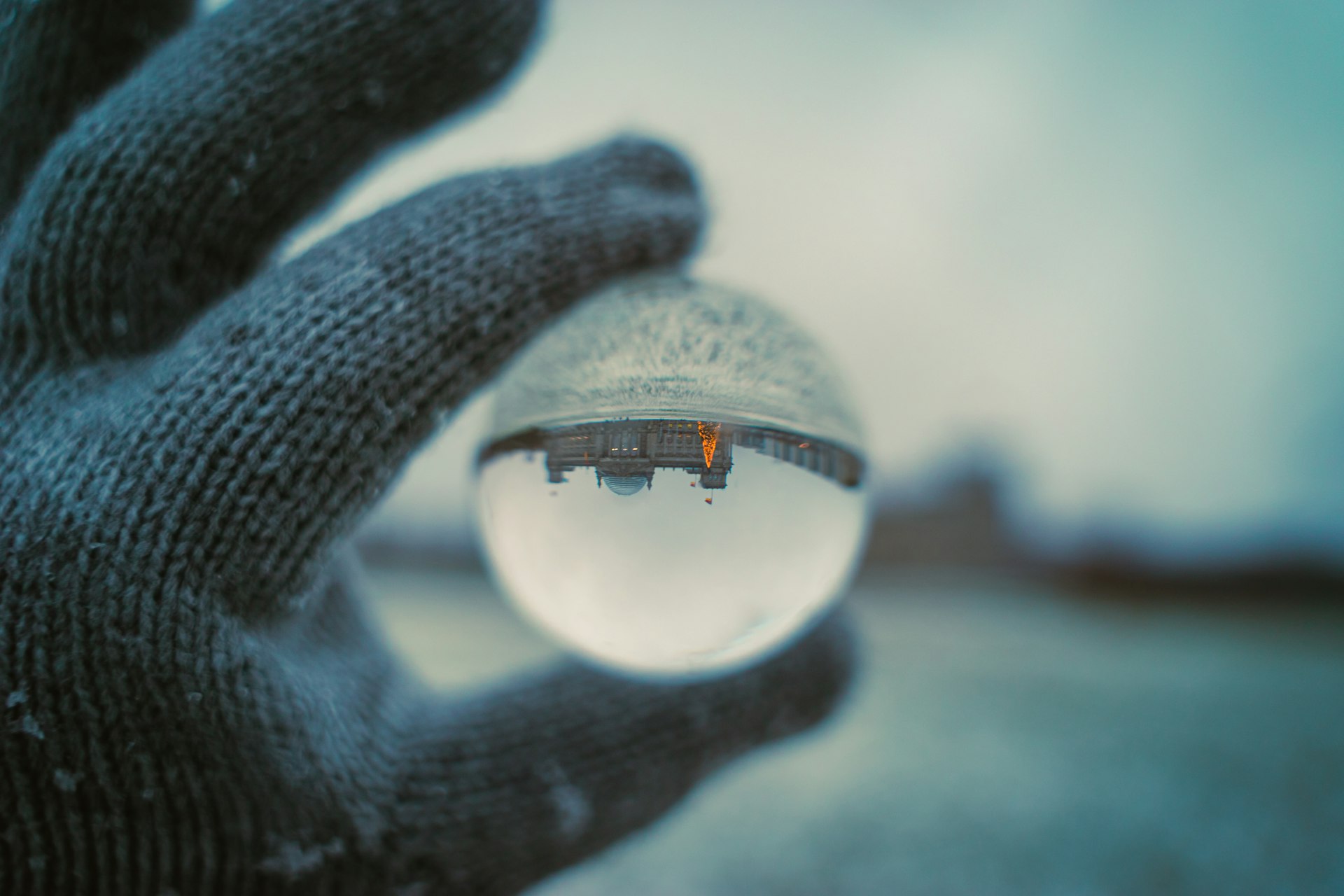 silver ring on persons finger